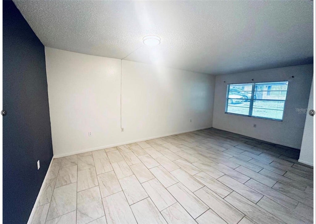 Photo of 101 Lake Hunter Drive #15 &amp; 16, Lakeland, FL 33803 (MLS # O6453149)