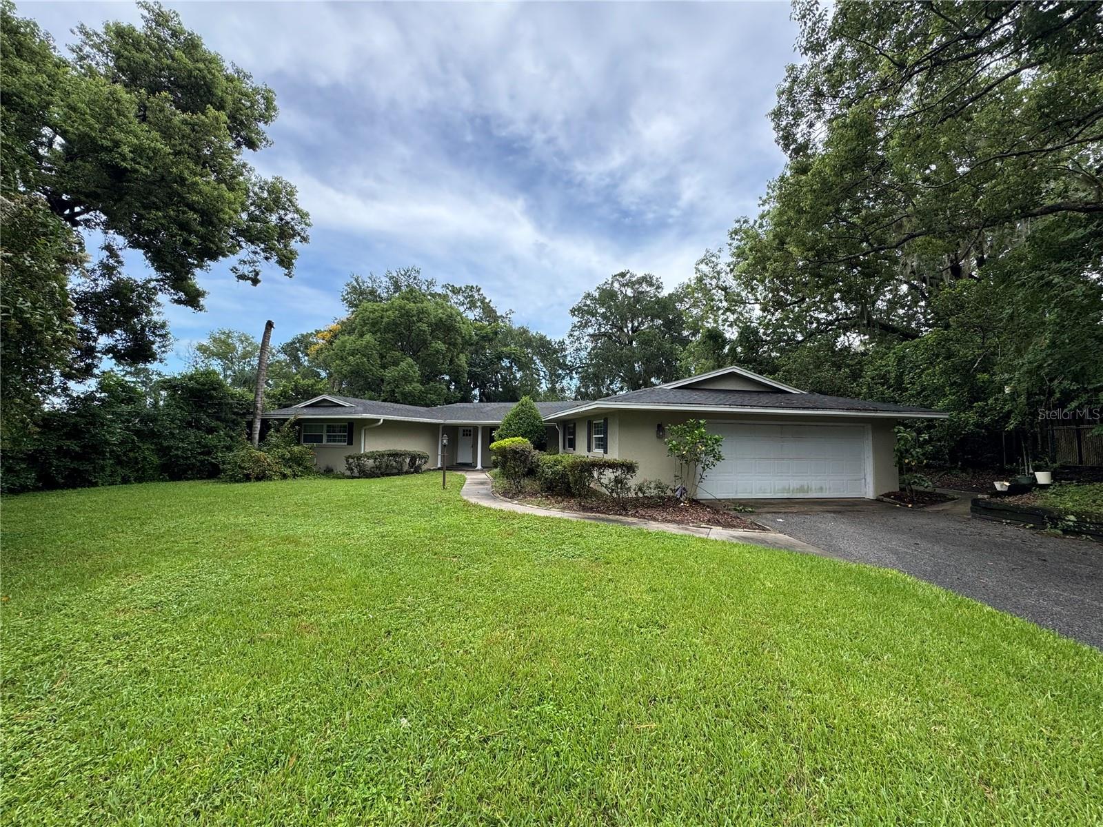 Beautifully updated 3-bedroom, 3-bath home in the sought-after Lake Gertrude area—just 5 minutes from charming downtown Mount Dora. Enjoy a spacious open floor plan filled with natural light, luxury vinyl flooring throughout, and a fully upgraded kitchen. The fully fenced backyard offers privacy and room to relax in a great neighborhood perfect for walking and running.