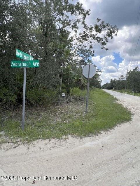 Nestled at the end of a long Limerock Rd but conviently located to shopping Schools and Highways Lovely building 1.2 Acre Lot for your SFH