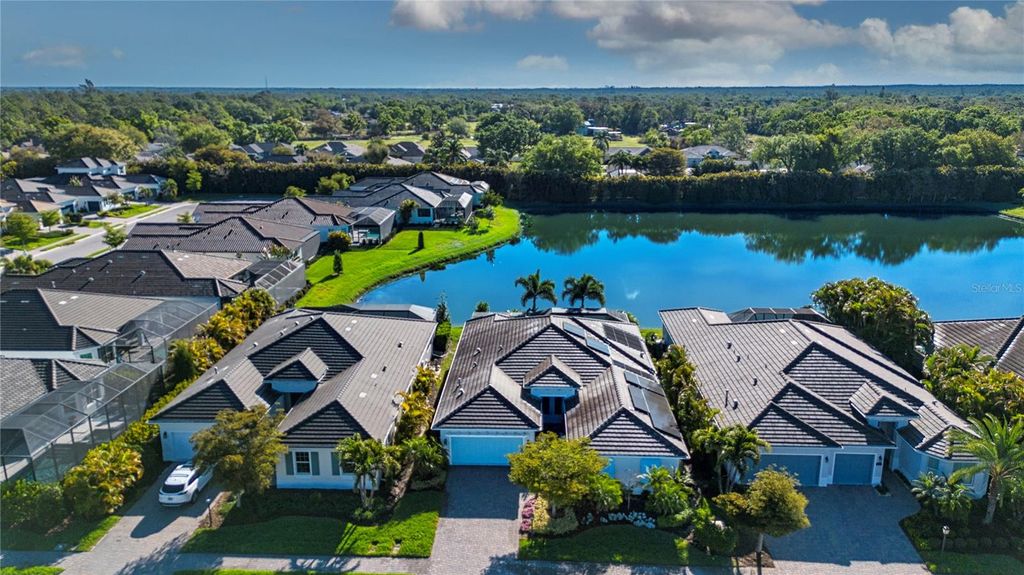 Photo of 7732 Sandhill Lake Drive, Sarasota, FL 34241 (MLS # A4687260)