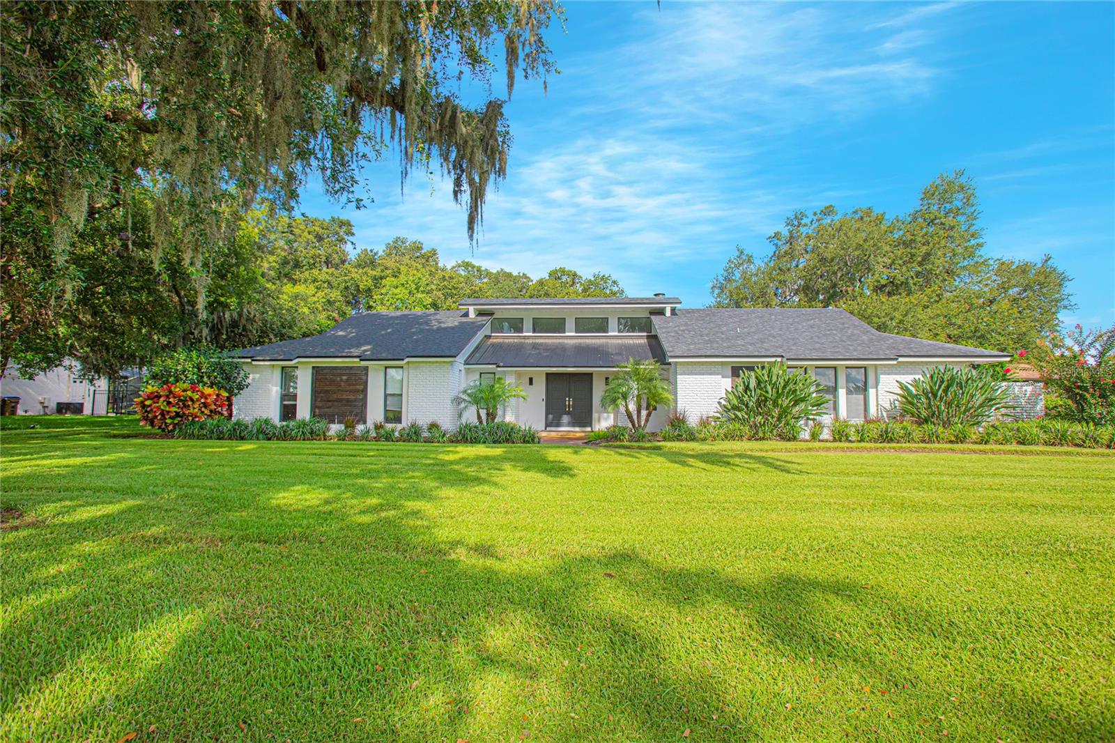 Welcome to this private retreat nestled near Lake Nona in the gated community of Lake Ajay! This beautifully upgraded pool home perfectly balances timeless elegance, modern comfort, serene privacy, and is located in one of the area's "best kept secrets!" The Lake Ajay community offers peace and tranquility for those who want to escape, yet still be close to work and major highways.
Featuring three spacious bedrooms, two bathrooms, and a versatile flex space ideal or a 4th bedroom, home office, or hobby room, the home offers over 2,000 square feet of thoughtfully designed living space — ideal for families, professionals, and those who simply love to unwind in style.
From the moment you arrive, you’ll be drawn in by the home’s inviting modern farmhouse design, complete with soaring wood-beamed ceilings, bricked walled fireplace, an abundance of natural light, and elegant ceramic tile flooring throughout.
At the heart of the home is a chef-inspired kitchen that’s equally beautiful and functional. Gather around the oversized center island with stone countertops, enjoy morning coffee at the breakfast bar, or unwind with a glass of wine from the built-in wine refrigerator. Outfitted with light cabinetry, stainless steel appliances, and an open layout that flows into the dining and living areas, it’s a space made for making memories.
The living room’s cozy wood-burning fireplace creates a warm and welcoming atmosphere — perfect for intimate evenings or lively gatherings.
Tucked away in its own private wing, the master suite is a true owner’s retreat, offering a large walk-in closet and a luxurious en-suite bath with dual granite-topped vanities, a relaxing tub with tile surround, and a private courtyard access for tranquil mornings or starry evenings.
Step outside and experience your own Florida paradise. The expansive screened lanai features a SPARKLING POOL, summer kitchen, skylights, and ceiling fans — an entertainer’s dream for everything from weekend BBQs to sunset swims. The fenced backyard offers a private, peaceful setting for children, pets, and endless outdoor enjoyment.
Residents of Lake Ajay enjoy outstanding community amenities including private tennis courts and a boat ramp offering direct access to Lake Ajay and the scenic Chain of Lakes that connect to Fells Cove and East Lake Toho. Spend your weekends boating, water skiing, or fishing just minutes from home.
Ideally located just minutes from Lake Nona’s Medical City, vibrant shopping, dining, entertainment, top-rated schools, and major highways, this home offers the perfect blend of privacy, convenience, and luxury.
UPDATES: New Roof 2021. HVAC 2023. Exterior Paint 7/2024. Variable Speed Pool Pump 2022. Three Year Home Warranty Paid in Full 11/2024. See attachment for more home updates.
Don’t miss your chance to own this exceptional residence — schedule your private tour today and discover the ultimate in Florida living!