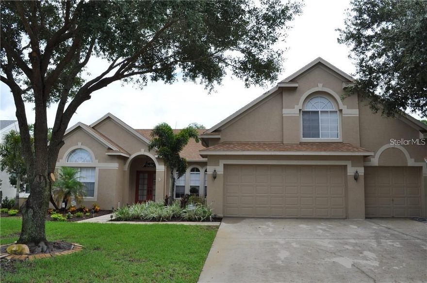 Available June 1st - Enjoy this beautiful 4 Bedroom, 3 Bath family home with an office/den and an upstairs bonus room which could easily be used as a 5th bedroom! There isn't any better way of experiencing the Florida lifestyle than in this well-maintained custom home! This home offers 2857 square feet of living space, gorgeous, tiled floors throughout the kitchen and family room along with hardwood floors in the formal living room and dining area and new carpeting in the bedrooms and upstairs bonus room. The gourmet eat-in kitchen complete with stainless steel appliances. granite counter tops, and cherry wood cabinetry will satisfy the pickiest of chefs. The primary retreat includes his and her walk-in closets with primary bath that includes a step-in shower, private WC, granite countertop and soaking tub. The outside features an enclosed salt water chlorinated, and solar heated pool surrounded by brick pavers overlooking a conservation area. Privacy galore except for the wildlife.  All this in the upscale community of Lansbrook offering walking distance to playground, soccer field, lake front park with boat ramp & day docks, walking trails and more! Tenant responsible for Electric, Water, and Internet Utilities. Lawn Sprinklers are on well system. Lawn, pool, pest control care, and trash are included in rent.