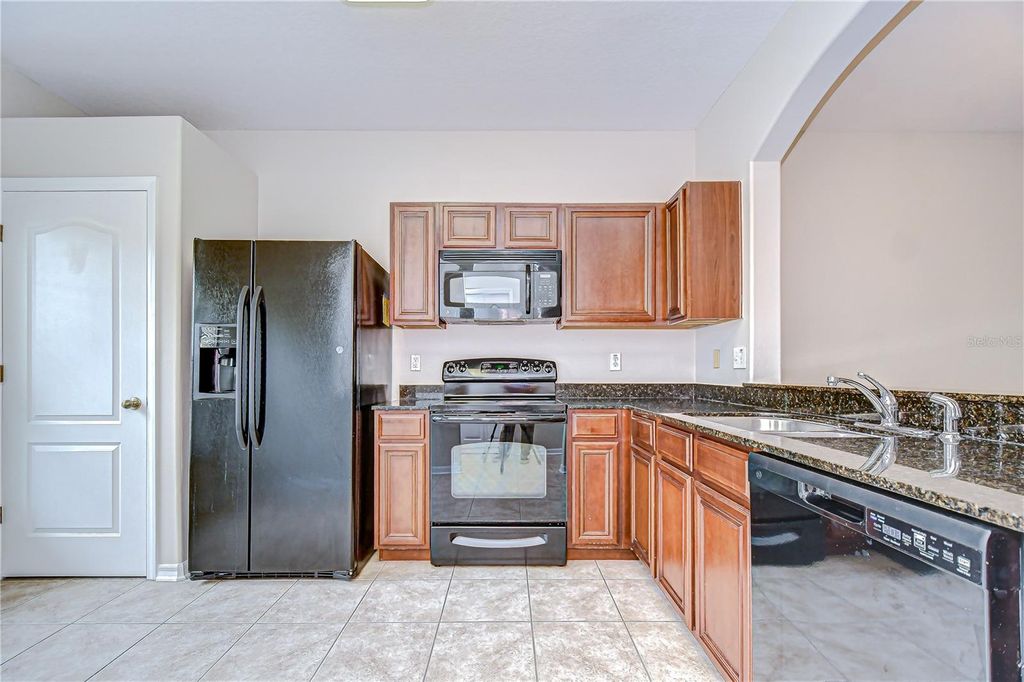 Photo of 1136 Sleepy Oak Drive, Wesley Chapel, FL 33543 (MLS # TB8415654)