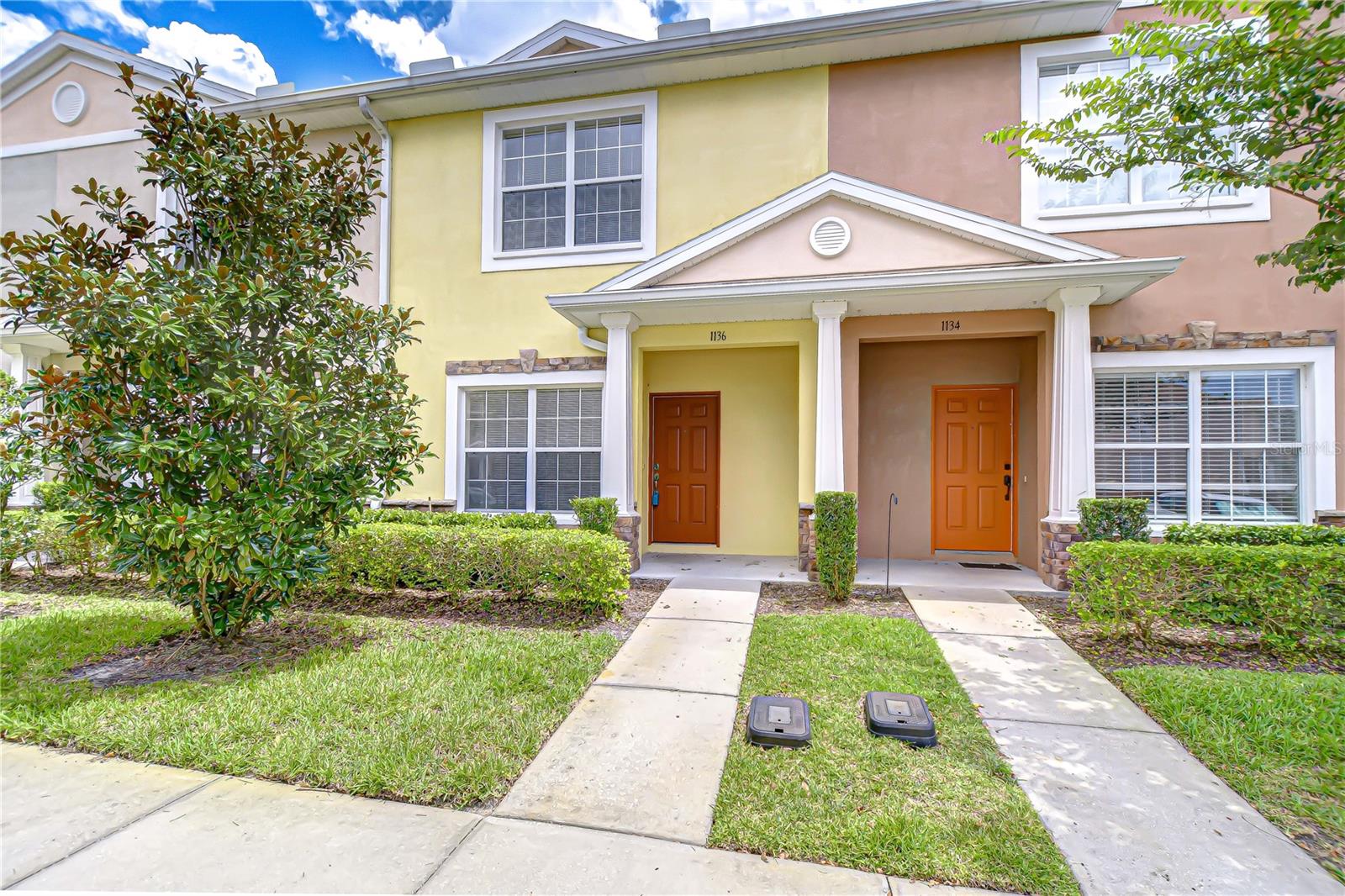 Welcome to this well maintained 2-bedroom and 2.5-bathroom block townhome in Wesley Chapel. The kitchen features, wood cabinets, granite countertops, a pantry and snack bar. There is a laundry closet steps inside the entry foyer along with a ½ bath. The combined dining and living room area has a built-in desk alcove and sliding doors that lead to the screened porch. This screened porch overlooks a pond and has outdoor storage. Upstairs are two bedrooms suites each with their own private bathrooms. The prime bedroom suite has double closets, and the bathroom features a double vanity. The upstairs bathrooms both have a tub with a shower. There is also a flex room upstairs that could serve as a den, playroom, home office, or additional bedroom space. This community is located in a convenient location to shopping, dining, and major highways. Don’t miss the chance to make this your new home-Schedule a viewing today!
