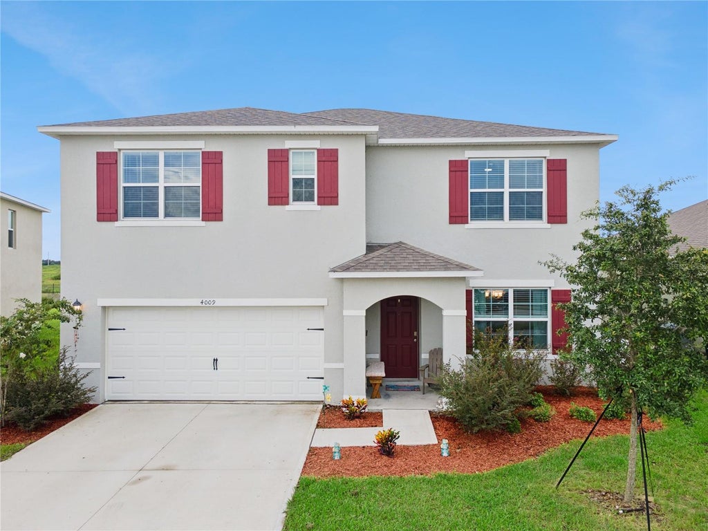 Photo of 4009 Grey Heron Loop, Bartow, FL 33830 (MLS # O6442429)