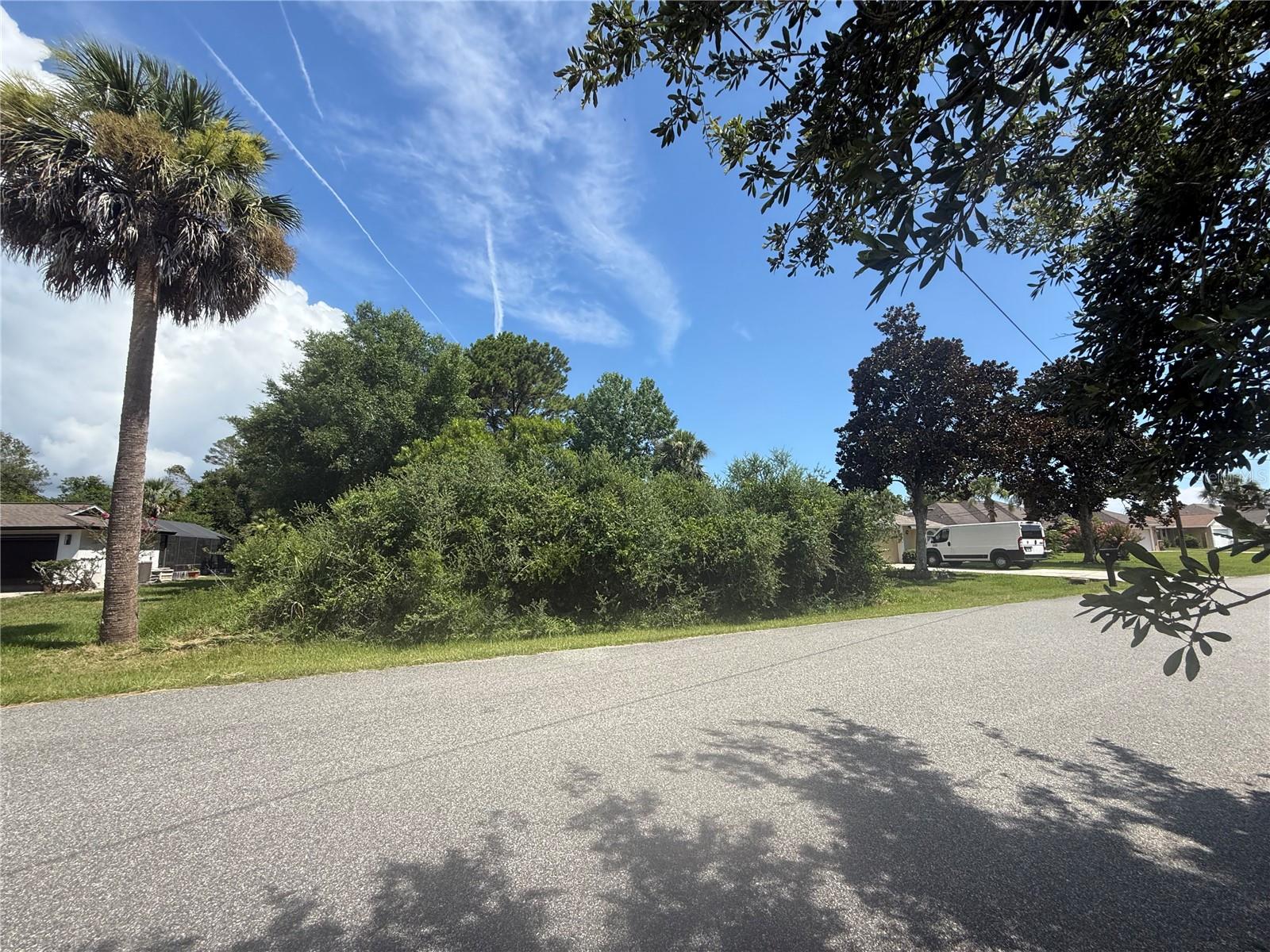 Bring your builder and floor plan to create your dream home in the coveted Palm Harbor area of Palm Coast! This lot is uncleared, giving you the opportunity to save some mature trees and design a unique tropical landscape of your choosing. Homes already existing on either side, across from and behind, so no immediately adjacent construction when your home is complete! Providing over 10,000 square feet of space, this property provides countless opportunities for your custom home design. Located east of I-95 and within minutes of shopping, beaches, restaurants, interstate and medical, you can enjoy the local conveniences while still being tucked away in this quiet residential area. Don't miss an opportunity to secure this great property to bring your coastal dreams to life!