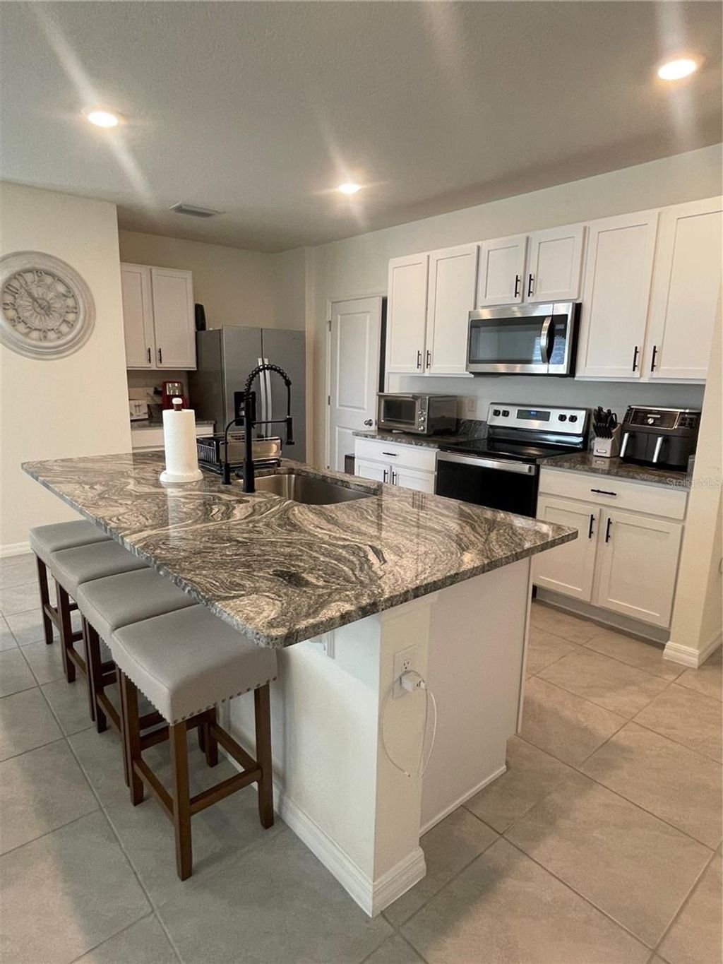 Photo of 33762 Jasmine Star Loop, Wesley Chapel, FL 33543 (MLS # TB8464310)