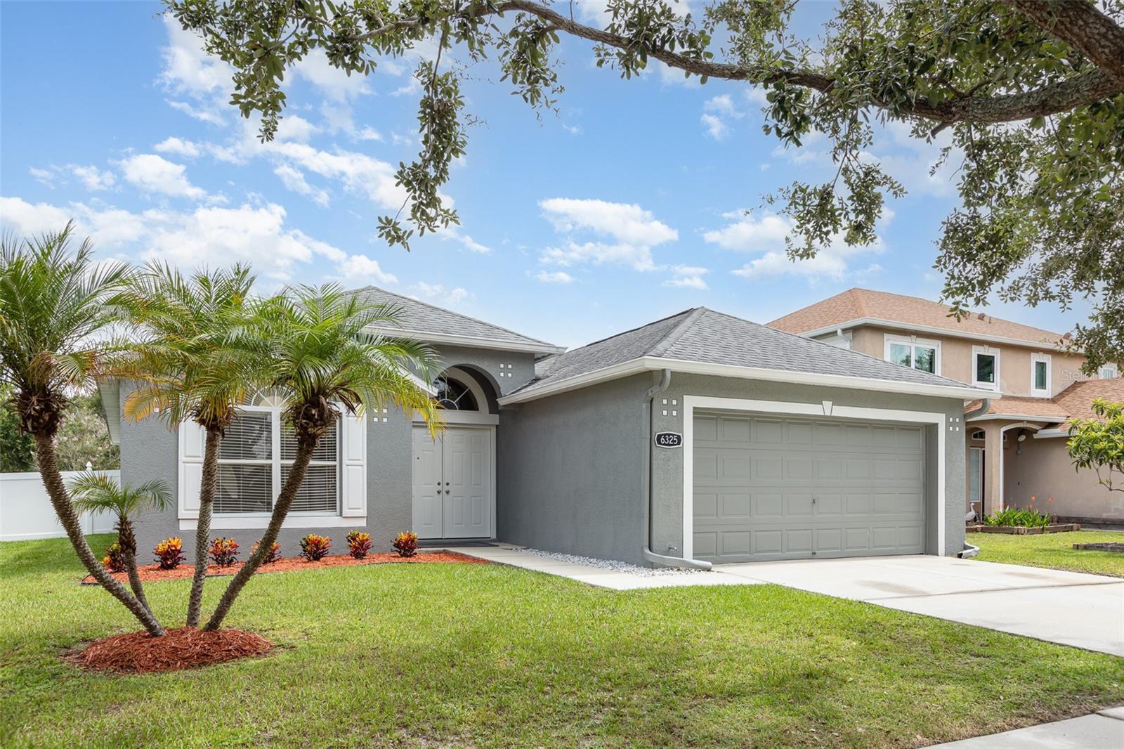 One or more photo(s) has been virtually staged. Move-In Ready Home w/ Quick Access to I-75 and Selmon Expressway!
Welcome to this very well-maintained 3 bedroom, 2 bathroom home offering 1,652 sq ft of comfortable living space in the heart of Riverview minutes from the new AdventHealth hospital. Built in 2003, this property combines a solid floor plan with key updates that matter most including a roof (2019), new A/C system (2024) w/ 11 year warranty, newer water heater (2021), and new appliances (2024)—providing peace of mind and long-term value.
Meticulously kept exterior boasts newer paint and fresh pressure washed driveway and sidewalk. As you enter the home, you’ll notice new Provia French Doors with a transferable lifetime warranty and new flooring in the foyer. Inside, enjoy a spacious and functional layout along with a bright open-concept living and dining area, and a kitchen equipped with a new range, refrigerator, dishwasher along with new Moen faucets. The primary suite includes a walk-in closet and en-suite bathroom with updated floors, new faucets, large countertop, spacious garden tub and West Shore Home shower, while two additional bedrooms and a full bath provides flexible space for guests, family, or a home office.
Outside, the covered patio features nearly 200 sqft of screened-in space for outdoor living. The fenced backyard provides space to relax, play, or entertain. The home is clean, move-in ready, and packed with potential for personal touches and future equity.
Located in a quiet, established neighborhood with low HOA fees, convenient access to the shopping, dining, schools, and major highways—this is an ideal opportunity for first-time buyers, investors, or anyone seeking a solid home in the heart of Riverview.
Don’t miss your chance—schedule your showing today!