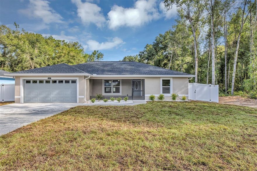 New construction, Move in Ready!! This Beautiful 3 bedroom, 2 bath, 2 car garage home was built to the highest of standards to include luxury vinyl plank flooring, Gourmet kitchen equipped with top-of-the-line Samsung appliances, top soft-close cabinets with crown molding, quartz counter tops and a sleek waterfall island, perfect for food preparation and entertaining, ceiling fans and inside laundry. This home has Modern light fixtures, quartz counters in all bathrooms, double sink in master with beautiful tile not to mention additional soft close drawers in master bath. The front entry is stunning with a modern front door, screened porch, beautiful landscaping plus rain gutters. Enjoy the beautiful Florida weather on the covered and screened back porch overlooking the fully fenced backyard!! The garage is epoxy coated and a 20-foot wide driveway these are just another of the builder’s personal touches to make your home complete and ready for your family to move in. NO HOA, Great location nearby shopping, dining, medical centers, Full one year builder warranty with an extended 2-10 warranty provided at closing. Come see this one, we know you will be impressed and get your offer in as it will sell quickly.