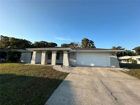 Photo of 7620 Cherrytree Lane, New Port Richey, FL 34653 (MLS # W7880118)