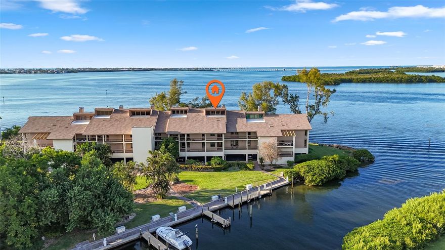 Rarely available at MARINER'S COVE! Waterfront condo offering breathtaking Intra-coastal Waterway views from this spacious 3B/2B residence with BONUS loft and 2,460 sq. ft. of living space, located in the private GATED community of Mariner’s Cove in Cortez FL. 2 large dogs allowed! This property is being sold in "white box condition", which means the condo has ALL BRAND NEW DRYWALL and ready for a new owner to finish and customize with texturing and painting the walls and ceilings. The unit experienced minor interior water intrusion from the roof during Hurricane Helene. Kitchens and bathrooms are updated. 
Enjoy a deeded 30’ x 16’ BOAT SLIP that accommodates up to a 32-foot vessel located just outside your front door, private ELEVATOR access, and 2 deeded under-building parking spaces with a private storage unit. The large screened lanai offers sweeping views of the Intra-coastal waters of ANNA MARIA SOUND where you can relax and watch dolphins, seabirds, and unforgettable sunsets. Inside laundry adds convenience. MONTHLY HOA FEE OF $1484 INCLUDES: Cable TV, 2 Community Pools, Escrow Reserves Fund, Fidelity Bond, Building Insurance, Internet, Maintenance Exterior, Maintenance Grounds, Maintenance Repairs, Manager, Pest Control, Private Road, Recreational Facilities, Sewer, Trash, Water, gate and tennis court maintenance.
Mariner’s Cove offers 2 heated swimming pools, a spa, 2 PICKLE BALL COURTS AND one TENNIS COURT, a scenic boardwalk along the marina, and lush tropical landscaping in a secure, gated environment. Located just half a mile from the Gulf beaches of Anna Maria Island and close to local favorites such as Tide Tables, Star Fish Company, and Cortez Kitchen. This is a rare opportunity to own a waterfront property with exceptional boating access and endless potential to create your ideal coastal retreat. SELLER FINANCING AVAILABLE.