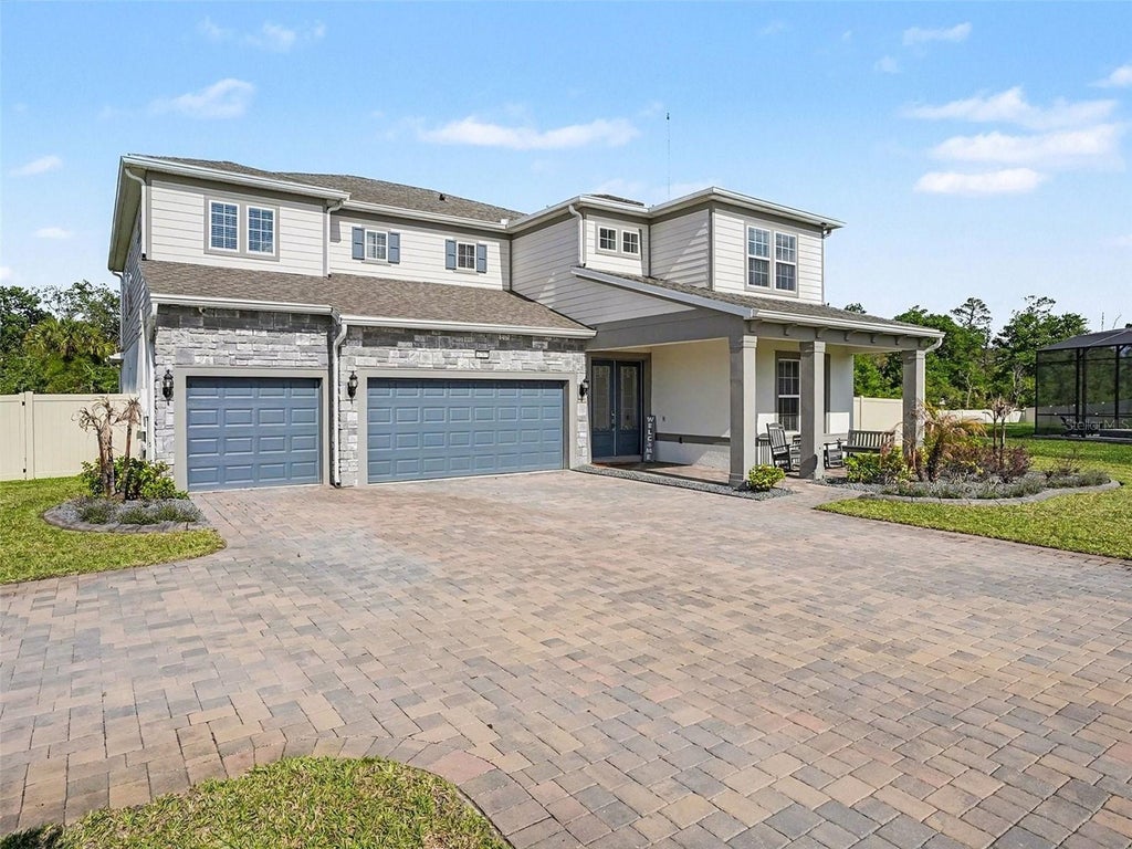 Photo of 4389 Sunset Preserve Boulevard, Orlando, FL 32820 (MLS # O6439034)