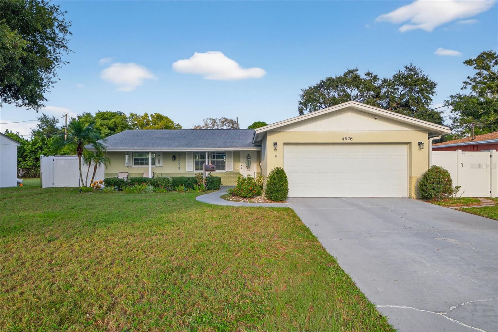 Welcome to Lakewood Estates, one of St Petersburg’s best kept, highly desirable secrets. This beautifully updated 3 bedroom, 2 bathroom home is situated directly across from the St Petersburg Country Club golf course.....
This is a well loved, immaculate home with a two car garage and a side, gated driveway that has an awning for whatever you park there and a HUGE, gorgeous storage shed out back. Everything about this home makes sense. It is not open concept but the living room and dining area flow into the kitchen in a way that encourages connection and yet you don’t flinch at every dirty dish. Granite countertops with a farm house sink complement the beautiful cabinets and there is a pantry for extra storage that will be the envy of all your friends.....
The primary bedroom with ensuite bathroom overlooks your peaceful backyard with lots of closet space. The other two bedrooms are on the opposite side of the home giving the primary a more private, sanctuary feeling.....
Just off the dining area is a large screened porch for entertaining and relaxing without becoming mosquito bait. The backyard is fully fenced. This home is NOT in a flood zone....
If you love golf, the beach or vibrant, downtown lifestyle, Lakewood Estates is central to it all. The St Petersburg Country Club’s pristine greenways, dotted with lakes and bunker sands weave through Lakewood Estates quiet residential streets, with the 18-hole golf course providing vistas of well-tended green space. You’ll see neighbors driving their golf carts to get togethers at “the club,”.....
With a strong community spirit, Lakewood Estates Civic Association is a voluntary neighborhood organization that organizes events and maintains community standards even though it's not an HOA......
Just steps away, Boyd Hill Nature Preserve provides endless trails and wildlife, while Bay Vista Park and boat launch are only 2.6 miles and Maximo Park and boat launch is just 1.9 miles, giving you easy access to water adventures. Vibrant downtown St Pete is 5.1 miles and St Pete Beach 5.9 miles.....
The combination of its golf-course setting, proximity to beaches and downtown St. Pete and strong community bonds makes Lakewood Estates particularly appealing for those seeking a peaceful yet well-connected Florida lifestyle..... Roof W Hurricane clips 2020 | HVAC 2022 | Water Heater 2020......To many updates to list, ask for the Property Info Book.