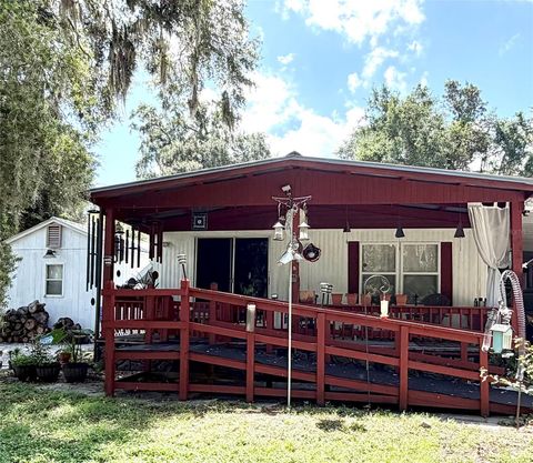 Photo of 3315 Cr 431n, Lake Panasoffkee, FL 33538 (MLS # OM725119)