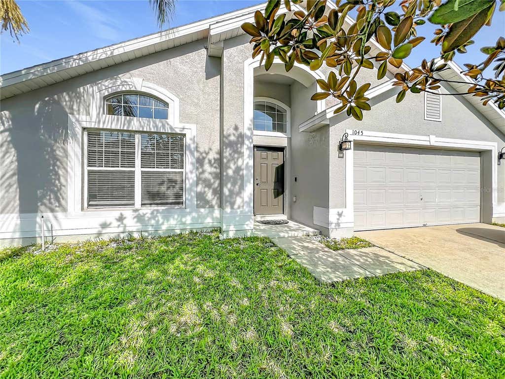 Photo of 1045 Willow Branch Drive, Orlando, FL 32828 (MLS # O6428625)