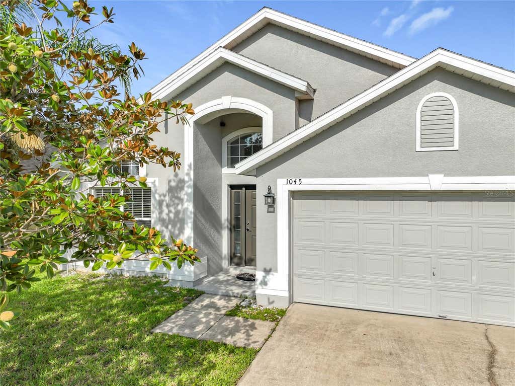 Photo of 1045 Willow Branch Drive, Orlando, FL 32828 (MLS # O6428625)