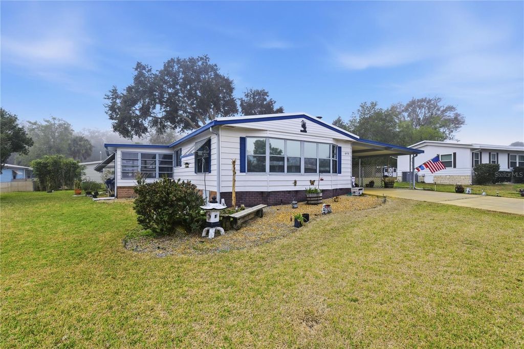 Photo of 6450 NE 1st Lane, Ocala, FL 34470 (MLS # OM720199)