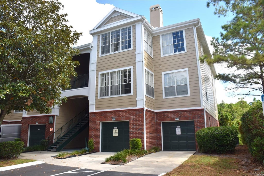 Photo of 13103 Mulberry Park Drive #836, Orlando, FL 32821 (MLS # O6453045)