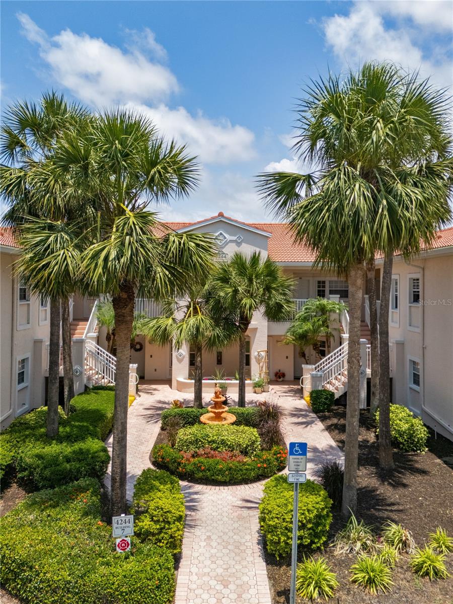 Live the Florida lifestyle in this beautifully updated condo located in the gated community of Plaza De Flores, in Sarasota’s desirable Palmer Ranch. This bright and private corner unit features vaulted ceilings, an open layout, and tile flooring throughout with no transitions—including in the bedrooms—for a clean, seamless look. The kitchen has been tastefully renovated with quartz countertops, a stone backsplash, newer appliances, a modern sink, and ample cabinet and island space—perfect for both everyday use and entertaining.
The split-bedroom layout provides comfort and privacy. The primary suite includes two walk-in closets, lanai access through sliding doors, and a fully remodeled en-suite bathroom featuring marble tile, a new glass shower door, new toilet, new lighting, and dual sinks. The guest bathroom features a new light fixture, faucet, hardware, and mirror. The guest bedroom offers vaulted ceilings and a large closet, making it perfect for visitors, a home office, or additional living space.
Step outside to the peaceful, 26-foot screened lanai, newly tiled and upgraded with new screens and ceiling fans—offering serene private views. The unit also features fresh paint throughout, updated lighting, ceiling fans in every room, a brand new tankless water heater, and custom blinds with recently added custom drapery that will convey with the sale.
Plaza De Flores is a Mediterranean-style community with new roofs, lush courtyards, fountains, and well-maintained tropical landscaping. Residents enjoy resort-style amenities including a heated pool, hot tub, tennis court, fitness center, clubhouse with kitchen and library, and on-site management. HOA dues include water, sewer, pest control, trash service, exterior building maintenance, insurance, and one assigned covered carport space.
Located next to the Stoneybrook Nature Trail with direct access to the Legacy Trail, and just minutes from world-renowned beaches like Siesta Key, Nokomis, and Venice. Plus, you’re close to Costco, shopping, dining, golf, and everything Sarasota and Venice have to offer. This move-in-ready condo is perfect for full-time living or a seasonal retreat—offering comfort, convenience, and the best of Florida’s Gulf Coast lifestyle.