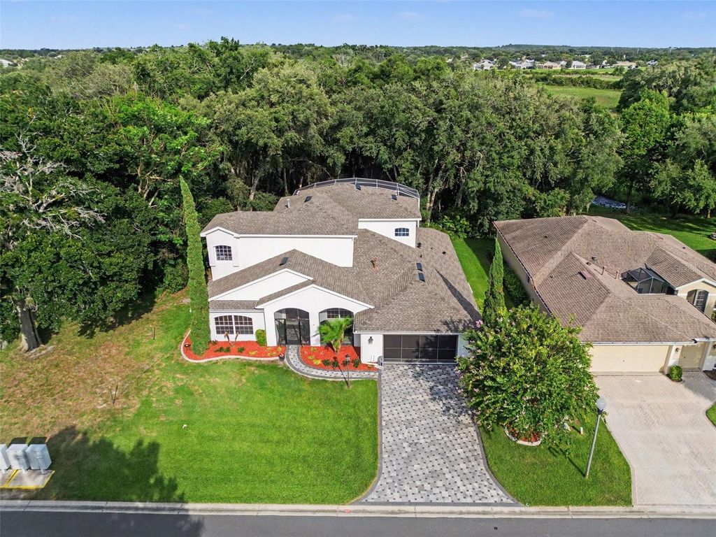 Photo of 5384 Aurora Drive, Leesburg, FL 34748 (MLS # O6418897)
