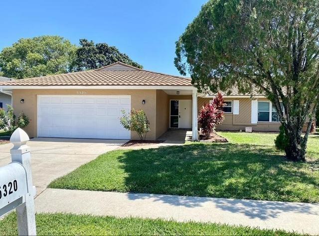 3 Bedroom 2 Bathroom renovated single family home. Large open Livingroom. Kitchen with updated stainless steel appliances and quartz countertop. Air Conditioned Florida room offers additional living space. Master Bedroom with attached renovated bathroom and walk in closet. 2 Additional bedrooms on the opposite side of the home share another updated Bathroom. Full size Washer and Dryer included. 2 car attached garage. Huge backyard with lawncare included features an open patio perfect outdoor dining and BBQ. Access to community club house with pool, tennis courts and more. & other activities. Located just minutes to Sea World, Universal & Disney tons of Restaurants and Shopping and only 15 min to the Airport. Rent also incudes enrollment in Blue Sky Property Management's Resident Benefits Package which includes renters insurance, OnDemand Pest Control, HVAC air filter delivered monthly, credit building to help boost your credit score with timely rent payments, $1M Identity Protection, move-in concierge service making utility connection and home service setup a breeze during your move-in, our best-in-class resident rewards program, and 24/7 Maintenance.