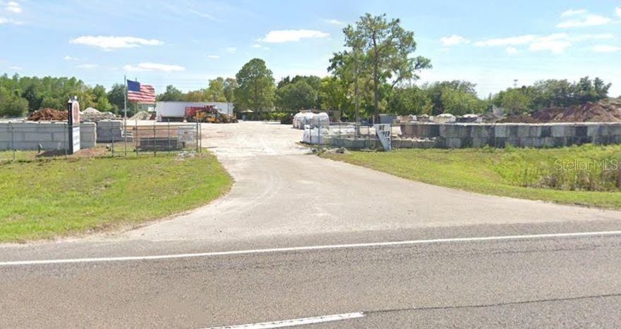 Large Commercial 1.43 Acre Lot With Manufactured Home/Office on Site. Roughly 200 Feet of frontage on SR 54 which allows for Signage on Site. Access also available from Black Lake Rd in back. The lot comprises 1.43 Acres with plenty of room to park Large Trucks, Boats, Trailers, Heavy Equipment, or store construction equipment. Ideal for a Landscaping Company. C-2 Commercial Zoning in place. Gated entrances on SR 54 and Black Lake Rd. Tenant responsible for all utilities and any improvements. Listing is As-is. Within minutes of Suncoast Expressway, US 19, I 75.