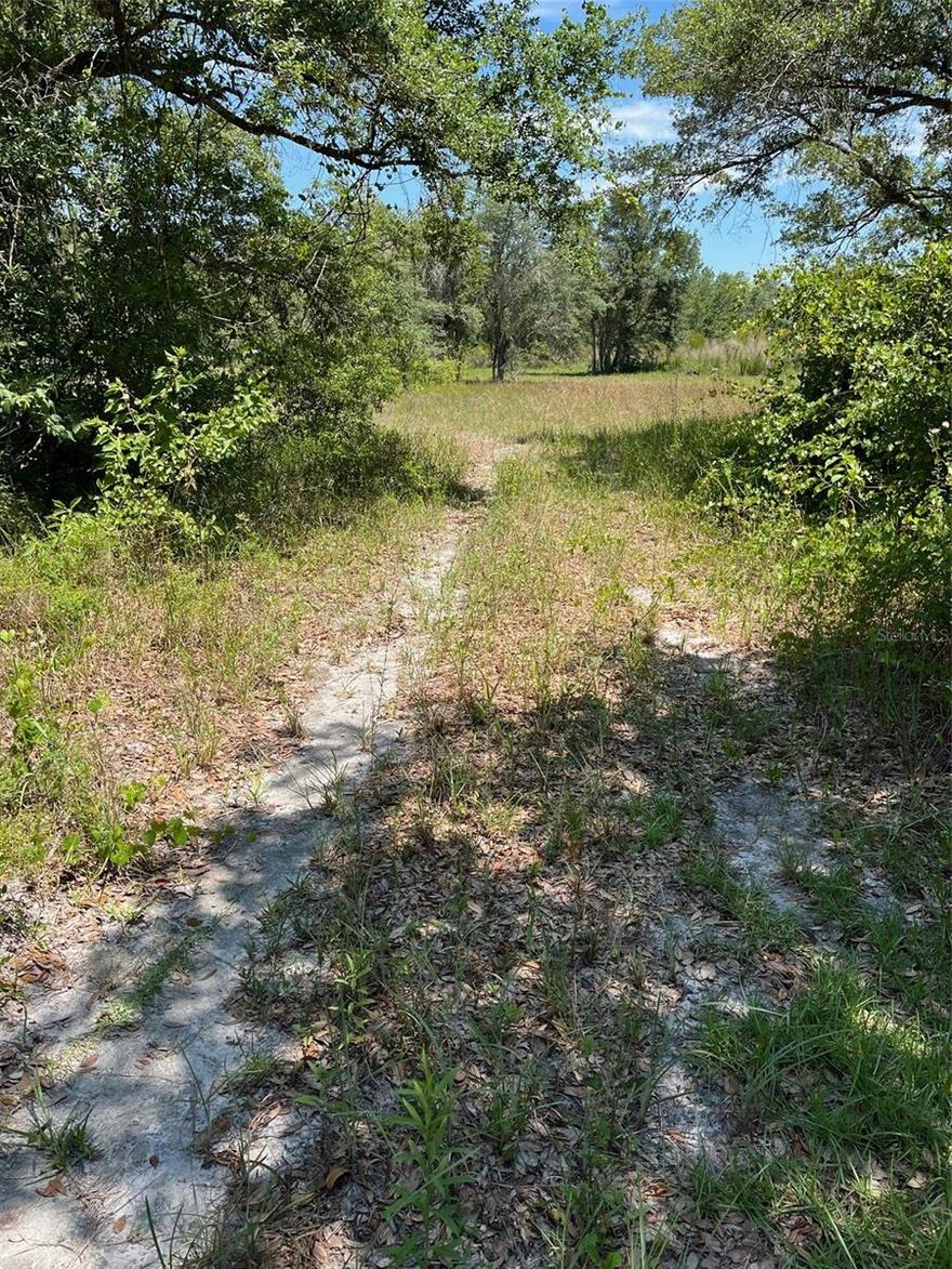 Take a look at this gorgeous ready to build corner lot in Ridge Manor Estates just over an acre. The large trees were kept for privacy from the road view and the internal lot clear with passage. Located near gas stations and eateries. Don't miss this opportunity to own this corner lot!