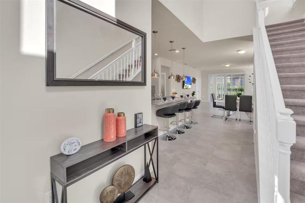 Photo of 7267 Oakmoss Loop, Davenport, FL 33837 (MLS # O6405153)