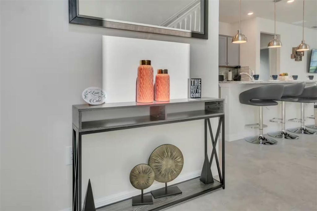 Photo of 7267 Oakmoss Loop, Davenport, FL 33837 (MLS # O6405153)