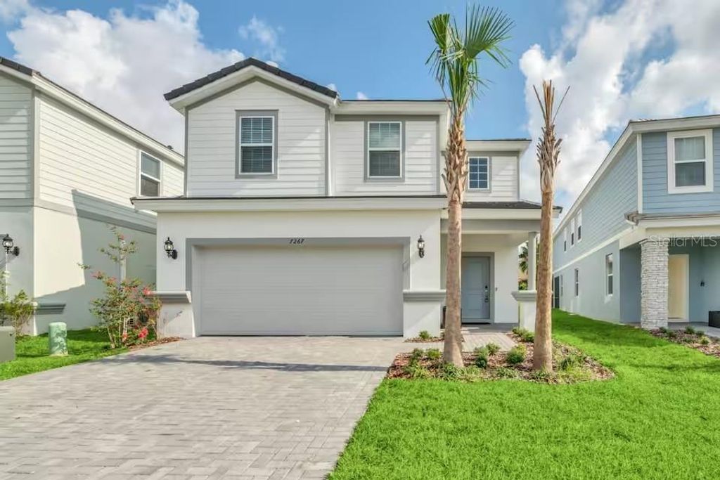 Photo of 7267 Oakmoss Loop, Davenport, FL 33837 (MLS # O6405153)