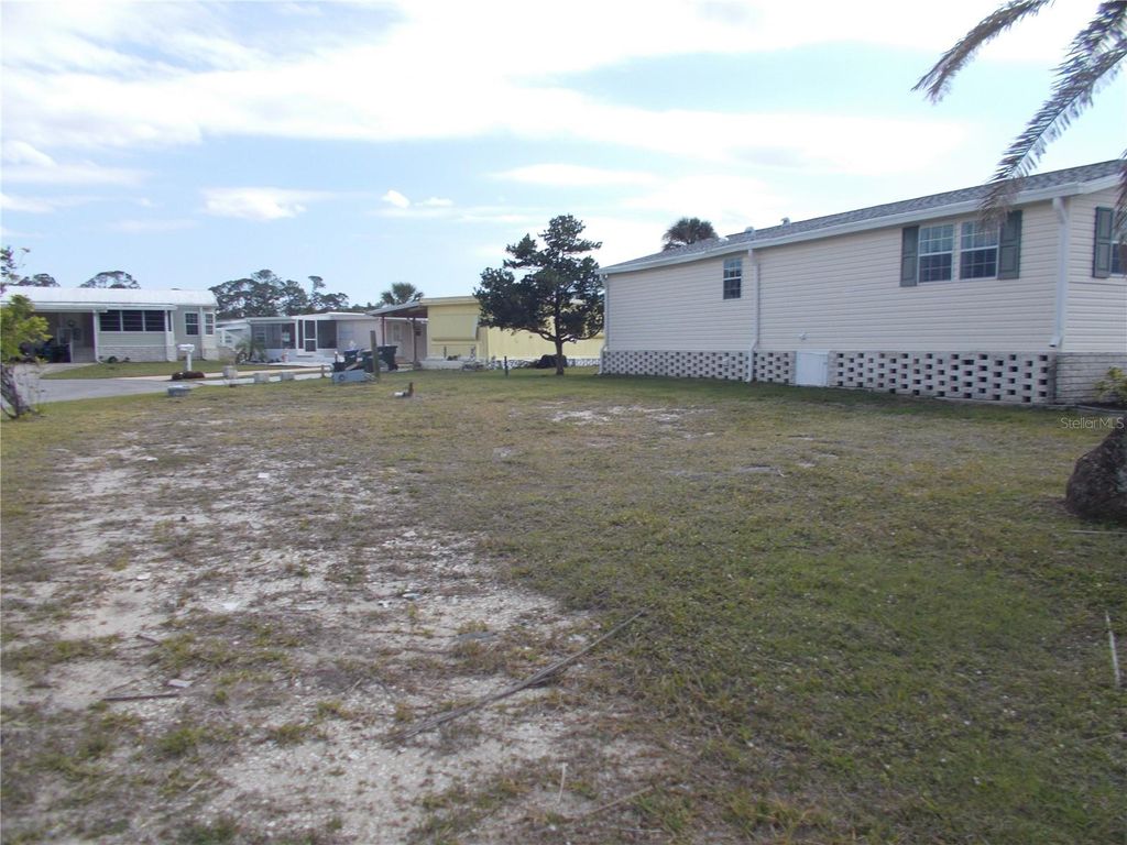 Photo of 5501 Holiday Park Boulevard, North Port, FL 34287 (MLS # C7506880)