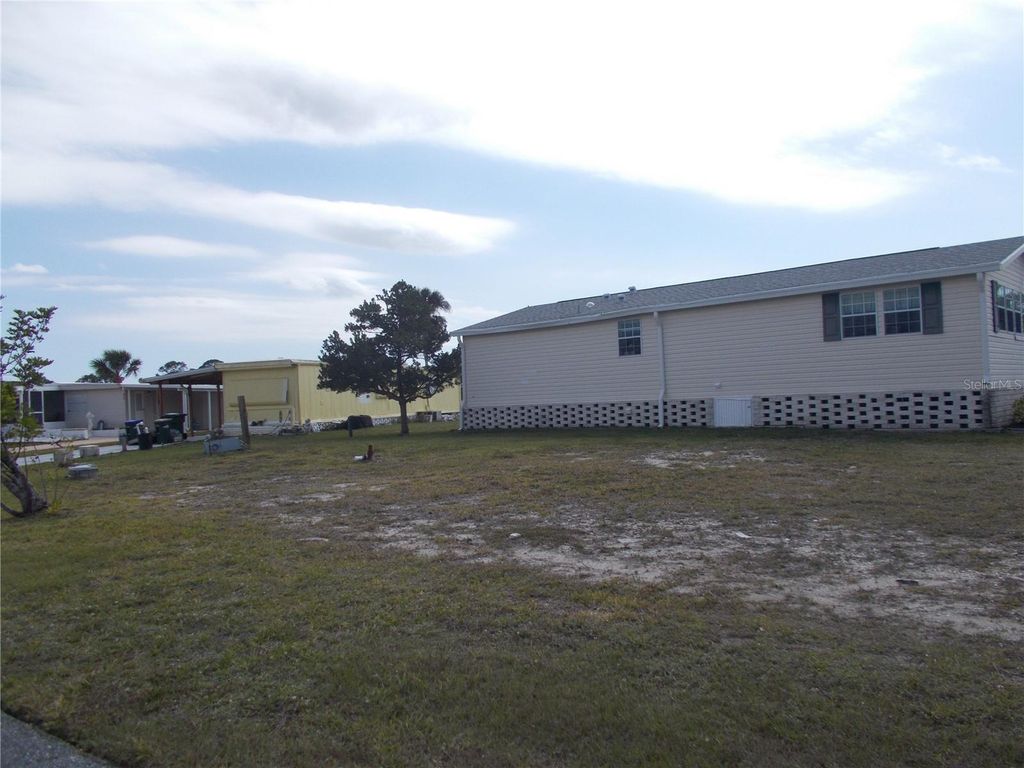 Photo of 5501 Holiday Park Boulevard, North Port, FL 34287 (MLS # C7506880)