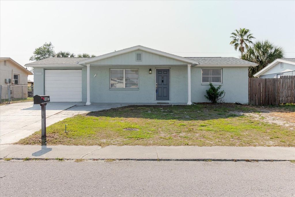 Photo of 9803 Richwood Lane, Port Richey, FL 34668 (MLS # TB8490819)