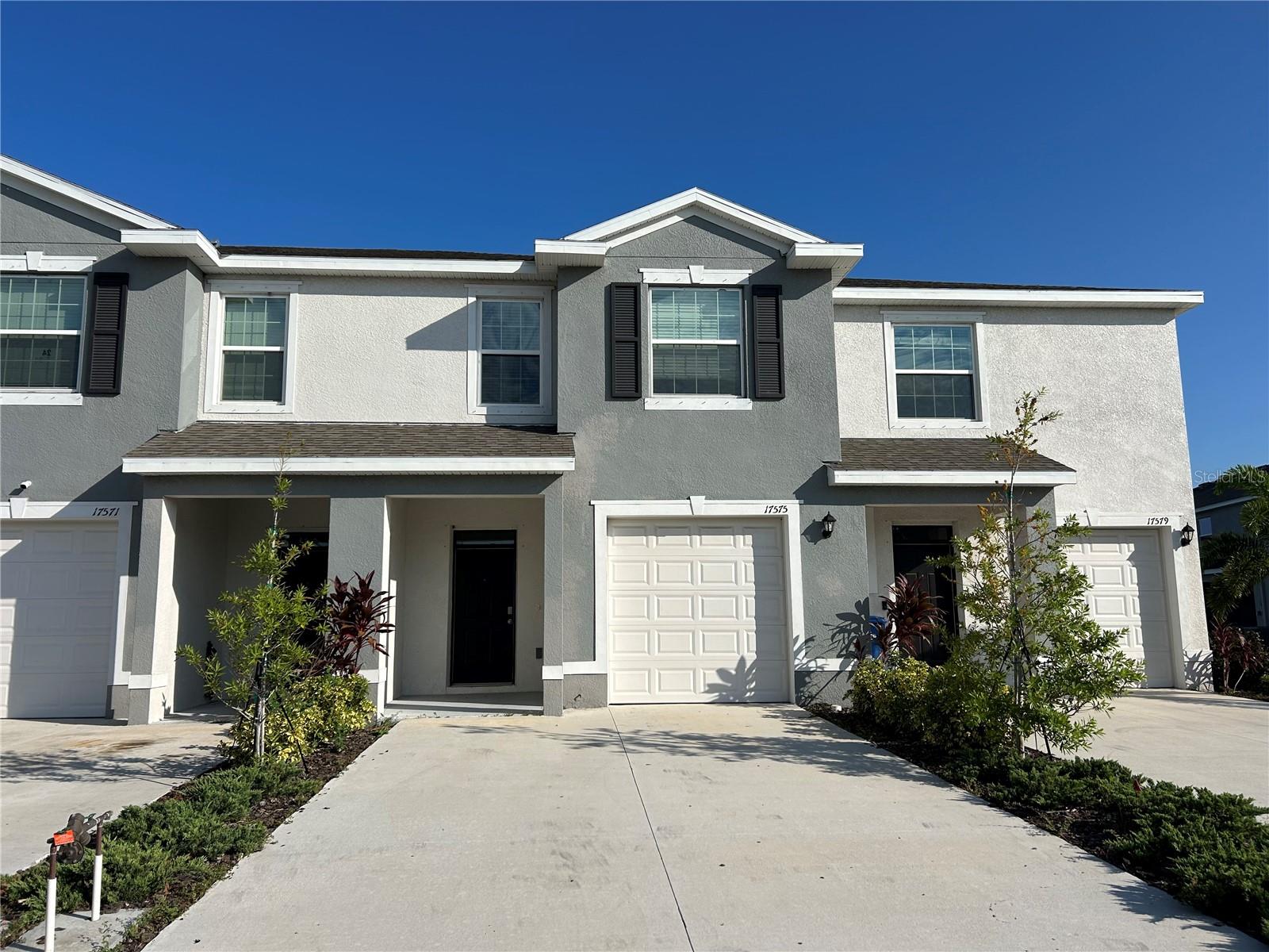 Welcome to the New community of Star Farms in Lakewood Ranch! This stunning 3-bedroom. 2.5-bathroom town home offers a perfect blend of modern elegance and comfortable living. As you step inside, you'll be greeted with an open-concept layout adorn with beautiful granite counter tops and stylish modern finishes that create a warm and inviting atmosphere. The spacious living area features recessed lighting and highlights the contemporary design, making it perfect for every day living and entertaining. The kitchen boasts stainless steel appliances, ample cabinetry, and an island that serves as a focal point gatherings. The serene Master suite includes a private bathroom and a generous closet. The additional bedrooms are perfect for guest. Step outside to the covered patio over looking a lake, where you can enjoy outdoor living at it's best. Attached 1 car garage offers convenience and added storage. Star Farms is an active community some of the wonderful amenities include a community pool, playground, tennis courts and basketball courts. Don't miss the opportunity to rent this wonderful town house. Schedule your showing today.