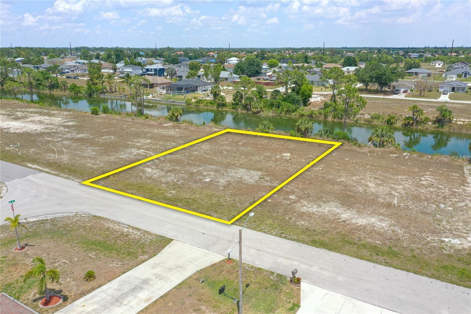 Welcome to your slice of paradise in Cape Coral! This prime canal-front lot is nestled in one of Cape Coral’s most desirable and rapidly growing areas. Offering direct freshwater canal access, it’s the perfect spot for kayaking, fishing, or simply enjoying peaceful waterfront views right from your backyard. Key Features: Southern Exposure Ideal for natural light and optimal pool placement. No HOA fees is required which the lot provides freedom to design and build your dream home. Utilities Nearby which is a cost-saving advantage during construction and convenient Location which is close to shopping, dining, schools, and all that Cape Coral has. Whether you’re an investor seeking your next opportunity or a future homeowner looking for the perfect waterfront lot, this property has everything you need to get started. Cape Coral continues to be one of the fastest-growing cities in Florida—now is the time to secure your spot in this thriving community! All information recorded in the MLS is deemed reliable but not guaranteed. Buyer to verify all information.