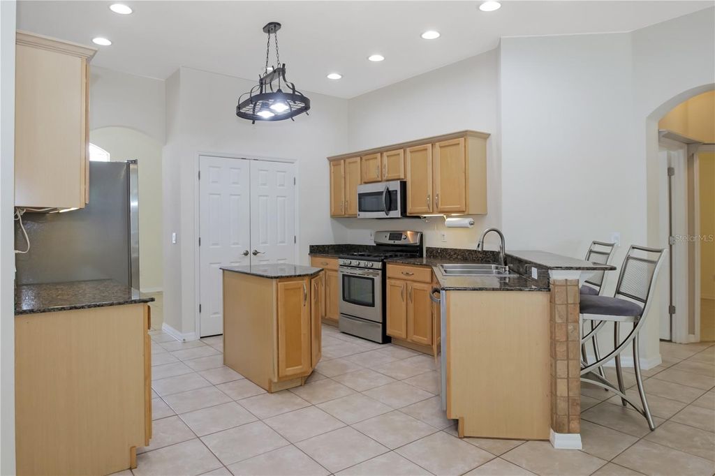 Photo of 140 Rangeline Woods Cove, Longwood, FL 32750 (MLS # V4948172)