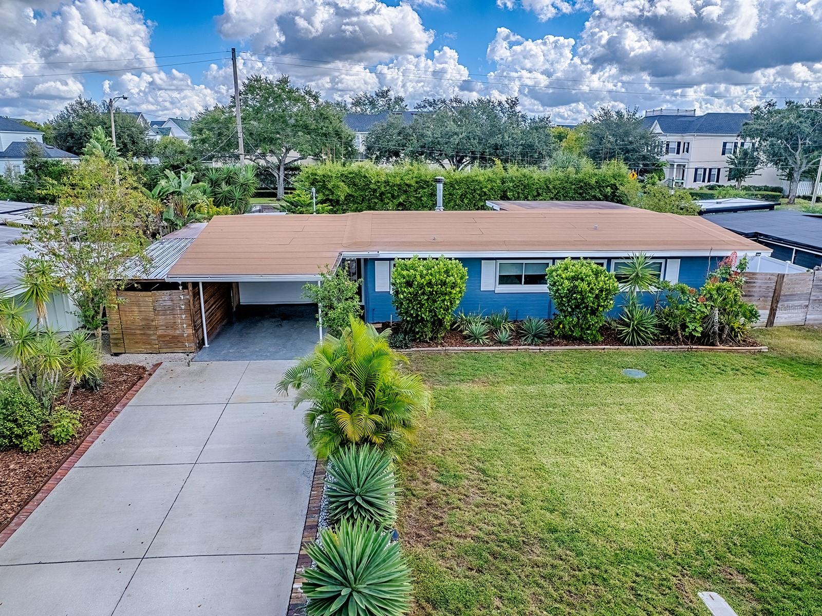 One or more photo(s) has been virtually staged. "UPDATED & MOVE-IN READY", 3-BED, 2-FULL BATHS, SINGLE FAMILY HOME WITH A LARGE PRIVATE YARD, WINTER PARK, FL 32789. This AMAZING LOCATION just off Corrine Drive is walking distance to East End Market and zoned for TOP-RATED Audubon Park (K-8) & Winter Park High (Magnet Program) Schools. The Owners completed a DETAILED HOME ADDITION & UPDATE in 2020 with over $115,000.00 of improvements, including a NEW Roof, NEW Primary Bath, EXPANDED Great Room, NEWLY Enclosed Entry way with mudroom and pantry, along with many mechanical & finishing upgrades. Enter the home through a fully ENCLOSED FOYER which allows easy access to the new MUDROOM, as well as the ENORMOUS GREATROOM, which features an open Family & Dining Room area that includes a Custom Wood Burning Fireplace, Decorative Shiplap Niche, Vaulted Ceiling, and a dual set of French Doors leading to the HUGE Patio & Back yard. The CHEF'S KITCHEN was redesigned to include 42" Wood Upper & Lower SHAKER CABINETS w/Soft Close Drawers, Quartz Countertops, HUGE FARM-STYLE Deep Sink w/Goose Neck Faucet, Custom Tile Backsplash, "LG" Stainless Appliances including a French Style Refrigerator, Flat-Top Range, Microwave, Dishwasher, Built-In Wine Refrigerator, Open-Wood Decorative Shelves & a Mid-Century Modern Bungalow Pendant. The Primary Suite was "RE-IMAGINED" and is the perfect COUPLES RETREAT which includes a Large Bedroom, Vaulted Ceiling, and a HUGE 14' LONG WALK-IN CLOSET w/Customizable Organizers to store all your Clothes & Accessories. The Primary Bathroom includes HIS & HERS Matching Vanities with Quartz Countertops, Recessed Sinks, Dual Mirrors & Hardware. Enjoy the luxury of a custom jetted soaking tub—ideal for unwinding after a long day or for families with young children, complete with a Tile Backsplash. The "WALK-IN SHOWER" features Frameless Glass, Custom Wall & Floor Tile and an OVERHEAD RAIN SHOWER. Finally, the bathroom features oversized 24"x24" Custom Floor Tile to complete the design features. Do you ENJOY OUTDOOR SPACE & like to Entertain? Do you need a SPACIOUS KIDS AREA for them to safely play? If so, you will FALL-IN-LOVE” with the fully fenced & enclosed back yard featuring two HUGE 12'x21' and 15'x27' OPEN PAVER PATIO areas perfect for all your outdoor furniture & equipment. Also enjoy your own PRIVATE TAVERN with an 8'x12' Bar designed with Corrugated Metal Panels, a Bar Top, Shelving & Concrete Floor. The Bar is OPEN FOR YOUR FRIENDS & FAMILY. The Backyard also includes (2) Separate Gate Entrances which will accommodate & secure your Boat, Trucks, Trailers, Work Equipment, etc. In addition, there is an 8'x8' and 5'x8' Storage Rooms. Additional Features: NO HOA, NEW Roof (2025), NEW Interior & Exterior Paint (2025), Tankless Water heater, Carrier HVAC System (2019), Updated Electric Panel (2019), Updated PEX Plumbing (2019), Newer 8"x36" Custom Tile Flooring, Newer Double Paned Windows (2019), NEW Drain field (2024), Block Construction, HUGE Inside Laundry & Storage Room with Custom Storage Organizers, 6" Baseboards, Window Treatments, Ceiling Fans & Lights, Open Carport (13'x21'), Covered Carport perfect for a Golf Cart (8'x17'), Hunter Irrigation System, Gutters & Downspouts, Amazing Updated Landscaping, Decorative Bamboo & much more. Just minutes to Park Avenue, Fine Dining, Leu Gardens, Downtown Orlando, Municipal & OIA Airports, Hwy 436, 408, 418, Turnpike, UCF & the Beaches. Call for more info or to schedule your private showing.