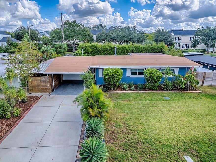 One or more photo(s) has been virtually staged. "UPDATED & MOVE-IN READY", 3-BED, 2-FULL BATHS, SINGLE FAMILY HOME WITH A LARGE PRIVATE YARD, WINTER PARK, FL 32789. This AMAZING LOCATION just off Corrine Drive is walking distance to East End Market and zoned for TOP-RATED Audubon Park (K-8) & Winter Park High (Magnet Program) Schools. The Owners completed a DETAILED HOME ADDITION & UPDATE in 2020 with over $115,000.00 of improvements, including a NEW Roof, NEW Primary Bath, EXPANDED Great Room, NEWLY Enclosed Entry way with mudroom and pantry, along with many mechanical & finishing upgrades. Enter the home through a fully ENCLOSED FOYER which allows easy access to the new MUDROOM, as well as the ENORMOUS GREATROOM, which features an open Family & Dining Room area that includes a Custom Wood Burning Fireplace, Decorative Shiplap Niche, Vaulted Ceiling, and a dual set of French Doors leading to the HUGE Patio & Back yard. The CHEF'S KITCHEN was redesigned to include 42" Wood Upper & Lower SHAKER CABINETS w/Soft Close Drawers, Quartz Countertops, HUGE FARM-STYLE Deep Sink w/Goose Neck Faucet, Custom Tile Backsplash, "LG" Stainless Appliances including a French Style Refrigerator, Flat-Top Range, Microwave, Dishwasher, Built-In Wine Refrigerator, Open-Wood Decorative Shelves & a Mid-Century Modern Bungalow Pendant. The Primary Suite was "RE-IMAGINED" and is the perfect COUPLES RETREAT which includes a Large Bedroom, Vaulted Ceiling, and a HUGE 14' LONG WALK-IN CLOSET w/Customizable Organizers to store all your Clothes & Accessories. The Primary Bathroom includes HIS & HERS Matching Vanities with Quartz Countertops, Recessed Sinks, Dual Mirrors & Hardware. Enjoy the luxury of a custom jetted soaking tub—ideal for unwinding after a long day or for families with young children, complete with a Tile Backsplash. The "WALK-IN SHOWER" features Frameless Glass, Custom Wall & Floor Tile and an OVERHEAD RAIN SHOWER. Finally, the bathroom features oversized 24"x24" Custom Floor Tile to complete the design features. Do you ENJOY OUTDOOR SPACE & like to Entertain? Do you need a SPACIOUS KIDS AREA for them to safely play? If so, you will FALL-IN-LOVE” with the fully fenced & enclosed back yard featuring two HUGE 12'x21' and 15'x27' OPEN PAVER PATIO areas perfect for all your outdoor furniture & equipment. Also enjoy your own PRIVATE TAVERN with an 8'x12' Bar designed with Corrugated Metal Panels, a Bar Top, Shelving & Concrete Floor. The Bar is OPEN FOR YOUR FRIENDS & FAMILY. The Backyard also includes (2) Separate Gate Entrances which will accommodate & secure your Boat, Trucks, Trailers, Work Equipment, etc. In addition, there is an 8'x8' and 5'x8' Storage Rooms. Additional Features: NO HOA, NEW Roof (2025), NEW Interior & Exterior Paint (2025), Tankless Water heater, Carrier HVAC System (2019), Updated Electric Panel (2019), Updated PEX Plumbing (2019), Newer 8"x36" Custom Tile Flooring, Newer Double Paned Windows (2019), NEW Drain field (2024), Block Construction, HUGE Inside Laundry & Storage Room with Custom Storage Organizers, 6" Baseboards, Window Treatments, Ceiling Fans & Lights, Open Carport (13'x21'), Covered Carport perfect for a Golf Cart (8'x17'), Hunter Irrigation System, Gutters & Downspouts, Amazing Updated Landscaping, Decorative Bamboo & much more. Just minutes to Park Avenue, Fine Dining, Leu Gardens, Downtown Orlando, Municipal & OIA Airports, Hwy 436, 408, 418, Turnpike, UCF & the Beaches. Call for more info or to schedule your private showing.