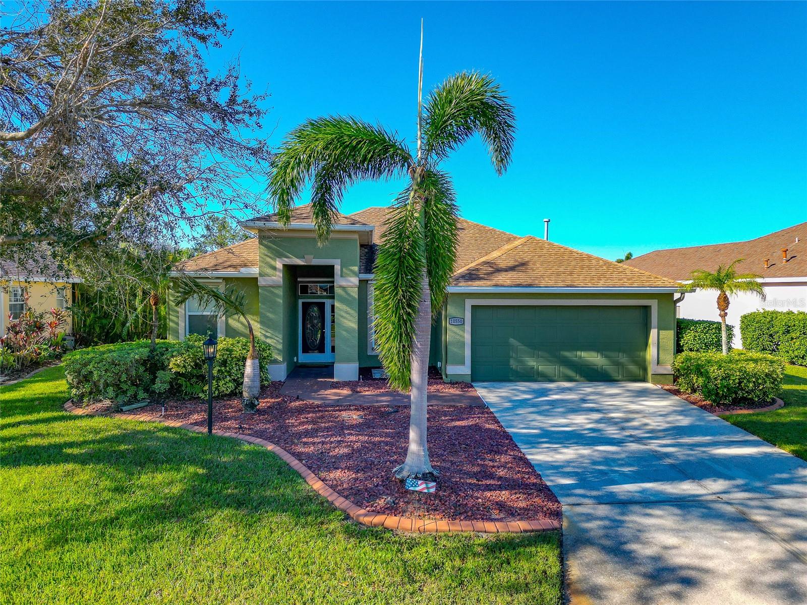 One or more photo(s) has been virtually staged. Welcome home to Greenfield Plantations where the beauty of Florida living meets the ease of a golf course community with no membership requirements and low HOA fees. This charming home is set on a larger lot showcasing a beautifully landscaped, well-shaded front yard where you step inside to a split floor plan that offers private sanctuaries.
The heart of the home opens to a spacious, relaxing lanai, perfect for entertaining with a built-in outdoor grill and designated refrigerator space. Sliding glass doors from both the primary suite and dining area lead directly to this outdoor oasis, seamlessly blending indoor and outdoor living. The primary suite is a true retreat, overlooking the sparkling pool and comes complete with his and her closets and a large, en suite bathroom. The second bathroom conveniently doubles as a pool bath, offering easy access to and from the lanai.
Located within a tranquil golf course community featurin gpicturesque ponds and "pay as you play" options, this home makes the Florida lifestyle both affordable and enjoyable. With gas appliances, low HOA fees and no CDDs, monthly costs stay manageable allowing you to focus on the relaxed lifestyle you've been seeking.
Experience Greenfield Plantations and discover how this thoughtfully home connects with the outdoors, creating a serene yet active lifestyle that's hard to resist.
