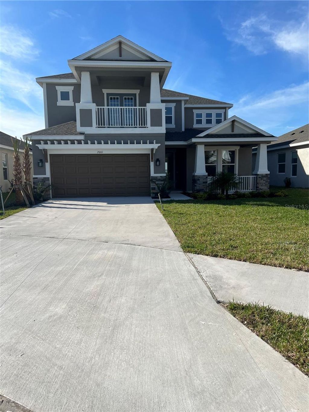 Photo of 2061 Riparian Lane, Wesley Chapel, FL 33543 (MLS # J970282)