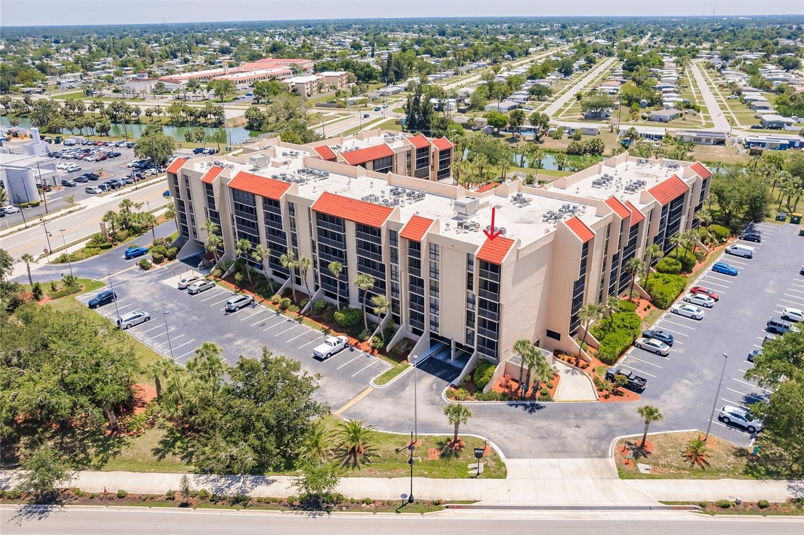 Looking for your winter retreat or maintenance free resort style living? Then, you are invited to tour this 1 bedroom, 1 bath, condo in the Promenades East Community. This is a fifth-floor corner unit. Nestled in the center of Port Charlotte with all conveniences and amenities nearby including hospitals, this condo features open floor plan with living, dining, and kitchen with breakfast bar that opens to the main living area for easy entertaining. Wall to wall sliders provide lots of natural light to flood the living area creating a bright and open atmosphere. The laundry area with washer & dryer is conveniently located adjacent to the kitchen. The bedroom has a nice sized closet and private access to the bathroom. You will enjoy relaxing on your balcony with additional storage closet. Other key feature water and sewer included in your condo fee! Promenades East amenities include waterfront heated pool and spa for year-round enjoyment, club house, planned activities, and secure access. Proximity to local waterways, beaches, dining, shopping, and golf courses makes this property ideal for the Florida lifestyle. Also, easy access to public boat ramps providing access to many waterways including beautiful Charlotte Harbor, the Peace and Myakka Rivers, and the Gulf of Mexico. Don’t wait to start enjoying your piece of Florida paradise!
**PLEASE ENJOY THE 3D INTERACTIVE VIRTUAL TOUR ASSOCIATED WITH THIS LISTING**
