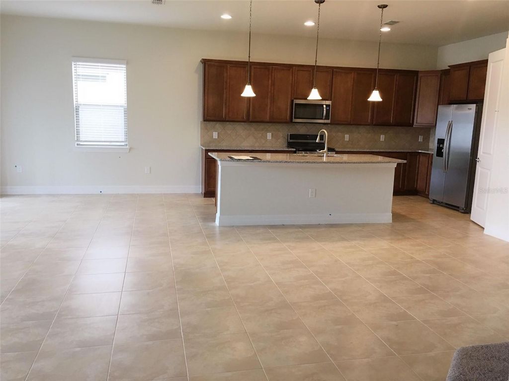 Photo of 11625 Meadow Grove Cir, Orlando, FL 32836 (MLS # O6405188)