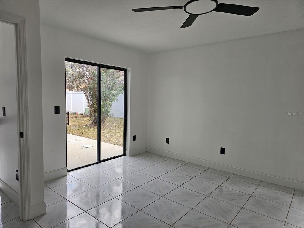 Photo of 826 Horseshoe Bay Drive, Kissimmee, FL 34741 (MLS # O6382770)