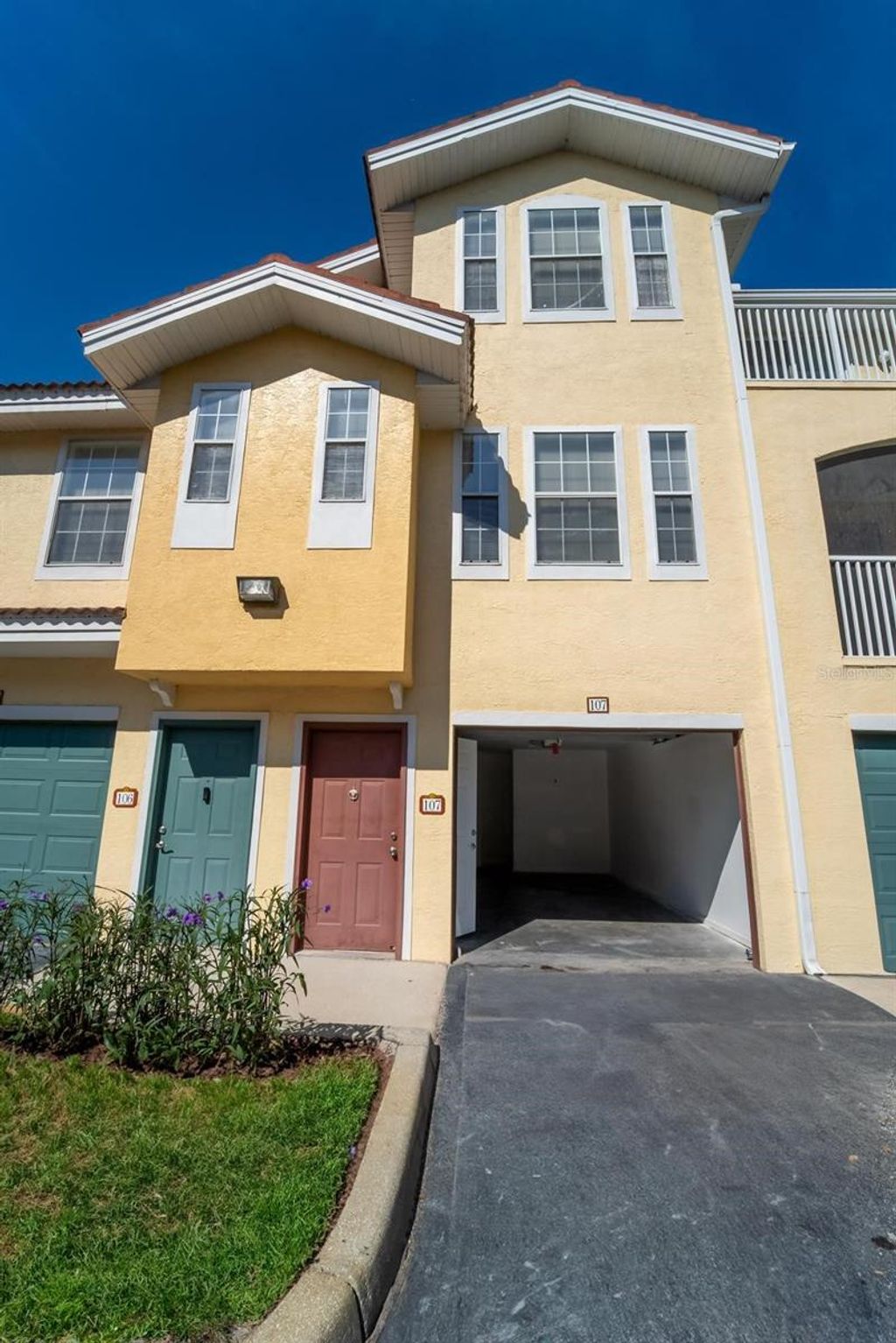 Photo of 12106 Poppy Field Lane #107, Orlando, FL 32837 (MLS # O6405492)