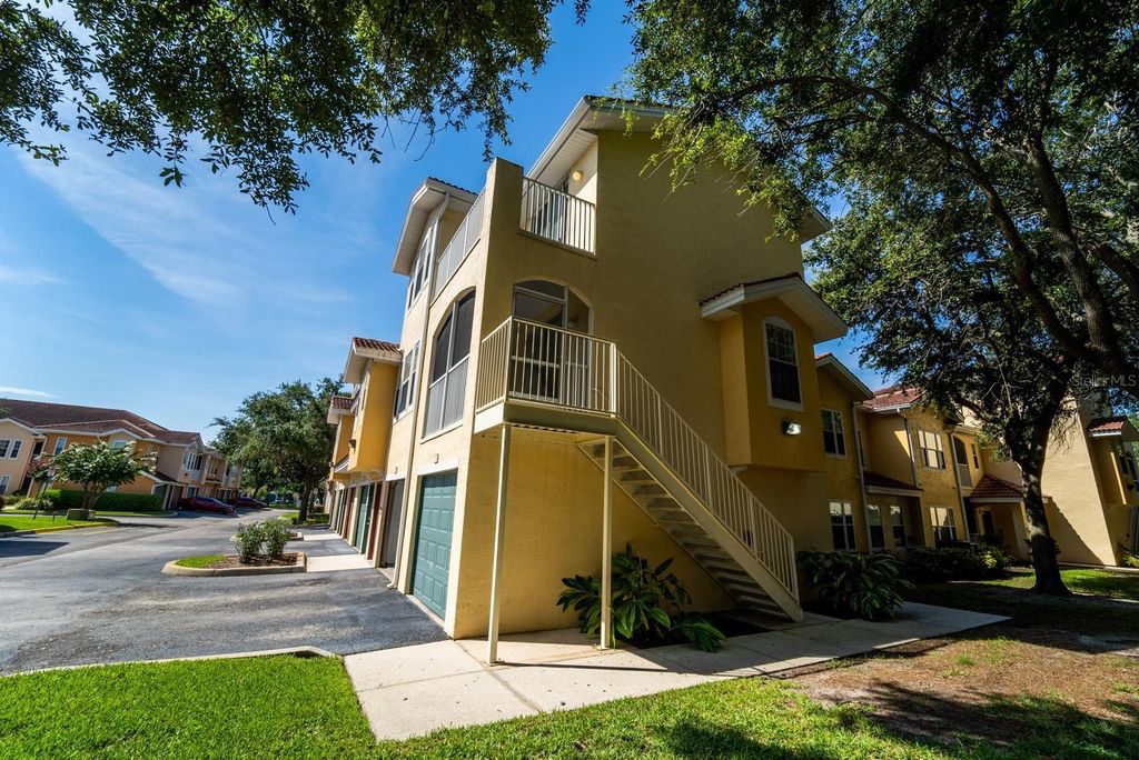Photo of 12106 Poppy Field Lane #107, Orlando, FL 32837 (MLS # O6405492)