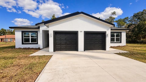 Photo of 3281 SW 158th Loop, Ocala, FL 34473 (MLS # O6447832)