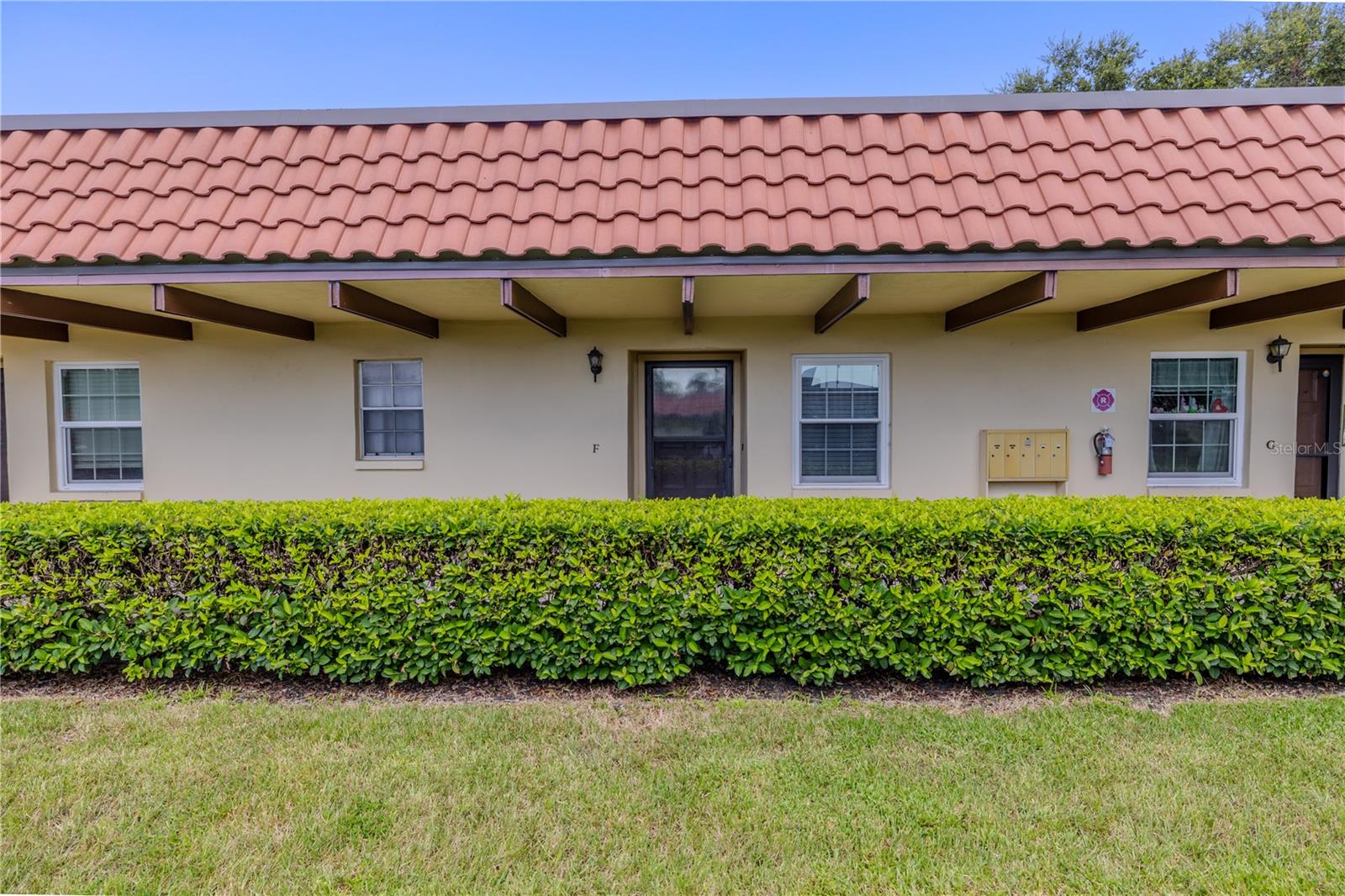 Tucked away toward the back of Pinehurst Village, a 55+ community, this peaceful and well-maintained 1-bedroom, 1-bath villa with a Florida room features the perfect blend of privacy, comfort, and convenience. With a bright, open layout and a neutral color palette throughout, this home is move-in ready and ideal for year-round living or a relaxing seasonal retreat. This villa also features a brand-new roof installed in 2024, offering added peace of mind and long-term value.
The light and airy kitchen features crisp light cabinetry, matching appliances, neutral tile flooring, and a functional layout that maximizes counter space. A double stainless steel sink, smooth-top range, built-in microwave, and full-size refrigerator provide everything you need, while a convenient pass-through window opens to the living area—perfect for entertaining or casual dining.
An adjacent dining nook offers a flexible space that can easily serve as a cozy breakfast area or work-from-home setup, enhanced by a stylish chandelier and a large window that fills the room with natural light. The open-concept living and dining area is comfortable and inviting, with soft gray walls, tile flooring throughout, and a ceiling fan to keep the air flowing.
The spacious bedroom includes a ceiling fan, large walk-in closet, and calming neutral tones for a serene atmosphere. The bright bathroom is well-appointed with a combination tub and shower, oversized vanity with integrated sink, large mirror, and grab bars for added convenience. A linen closet just outside provides additional storage.
A standout feature of this home is the Florida room—an enclosed bonus space with large windows that overlook lush greenery, perfect for use as an office, hobby room, or tranquil reading area. The laundry closet is equipped with a stacked washer and dryer, shelving, and room for utility storage, all neatly tucked away for efficiency.
Pinehurst Village is an active 55+ community featuring beautifully maintained grounds, sidewalks for leisurely strolls, shuffleboard courts, a heated pool, and a scenic park with picnic tables and grills. Ideally located near the Dunedin Community Center, library, fine arts center, aquatic complex, and only about a mile from Downtown Dunedin’s vibrant shopping, dining, and waterfront scene. A public boat ramp, major hospital, and Countryside Mall are also just minutes away.
Don’t miss the chance to live in one of Dunedin’s most desirable and walkable locations—peaceful, convenient, and full of community charm!