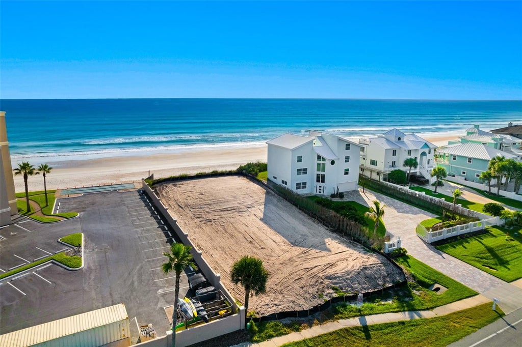 Photo of New Smyrna Beach, FL 32169 (MLS # O6431111)