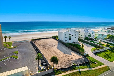 Photo of New Smyrna Beach, FL 32169 (MLS # O6431111)
