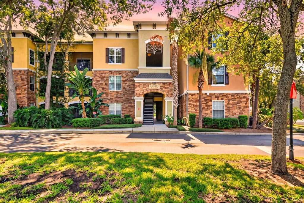 Photo of 10103 Courtney Oaks Circle #302, Tampa, FL 33619 (MLS # TB8545272)